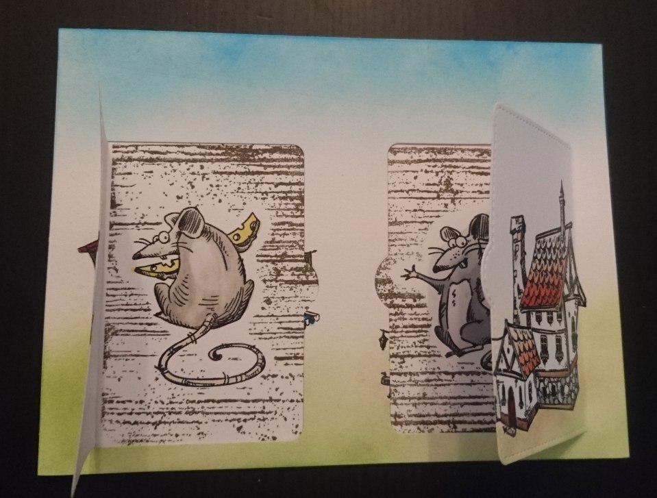 Den holzartigen Hintergrund habe ich gestempelt – und die Ratten vorher maskiert.